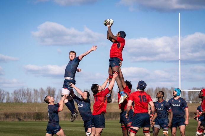 Students playing rugby